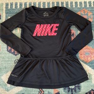Nike peplum dri-fit long sleeved top - size S (4-5)